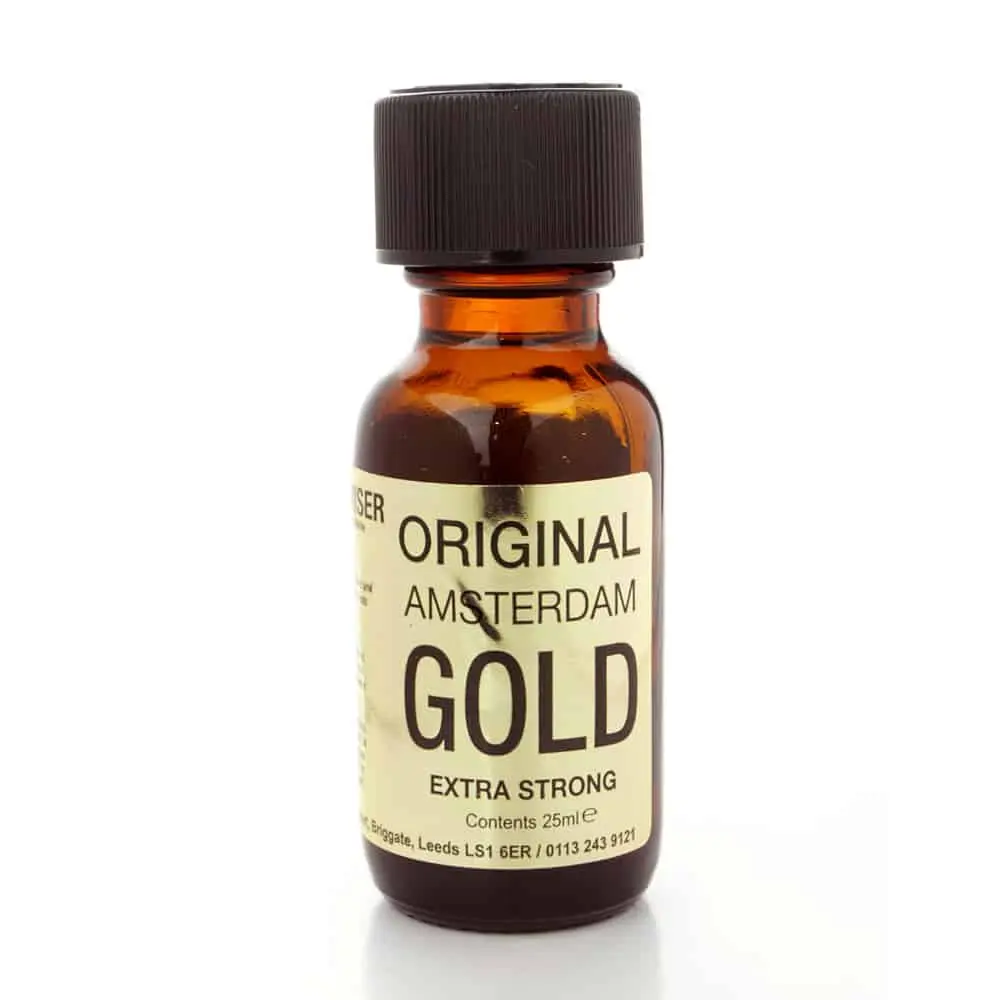A small amber glass bottle with a black screw cap, labeled "original amsterdam gold extra strong poppers 25ml. " the label also provides volume information (25ml) and contact details including an address in leeds and a phone number.